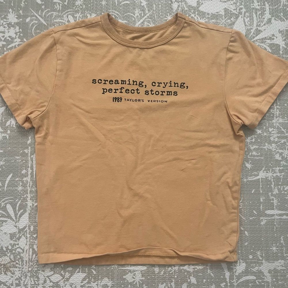 Taylor Swift Peach Graphic Crop Top with Black Text